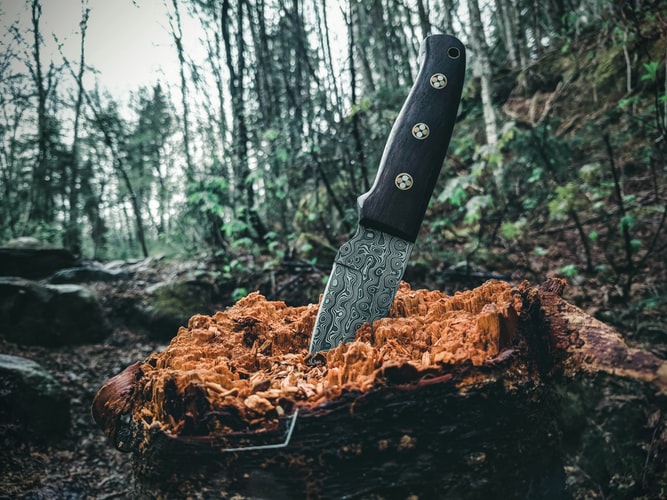 knife stuck in a block of wood